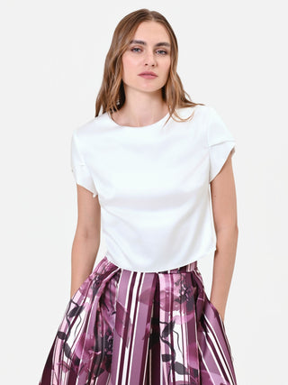 Blouse crème à manches à revers