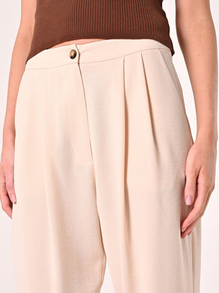 Pantalón efecto gofrado beige