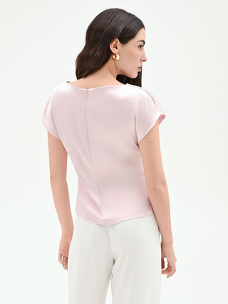 Blusa de satén rosa pastel con detalle asimétrico