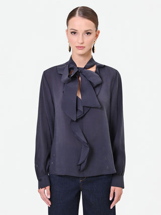 Blusa blu navy con collo a fiocco e volant