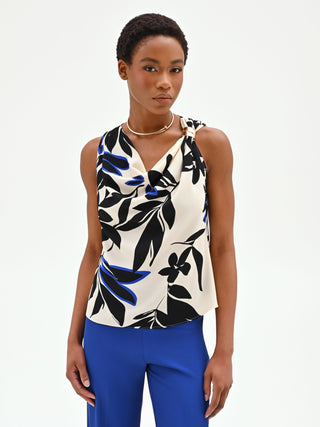 Top asimmetrico blu cina con stampa astratta