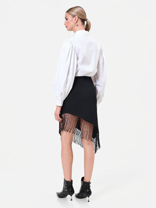 Jupe noire asymétrique à franges lumineuses