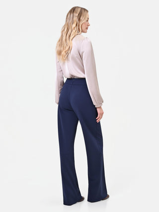 Pantalone a gamba larga blu navy con catenella dorata