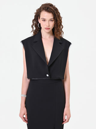 Schwarze Cropped-Weste mit Schmuckknopf