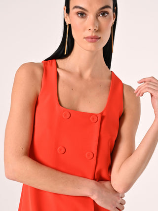Robe fourreau orange avec boutons sertis
