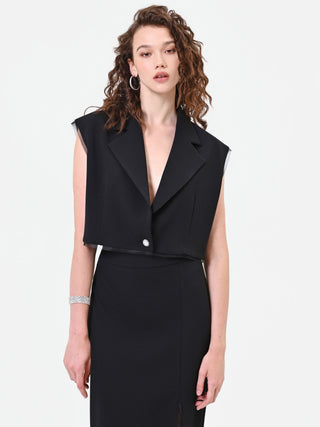 Schwarze Cropped-Weste mit Schmuckknopf