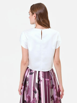 Blouse crème à manches à revers