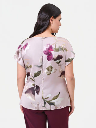 Blusa Curvy panna con stampa floreale e fondo asimmetrico