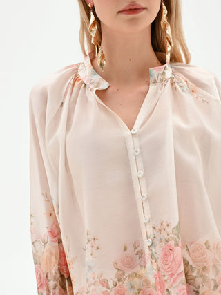 Blouse blanche à imprimé roses