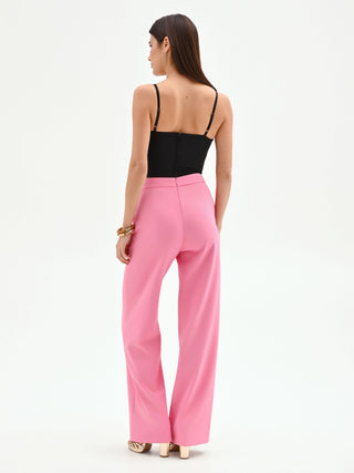 Pink palazzo trousers with a jeweled belt