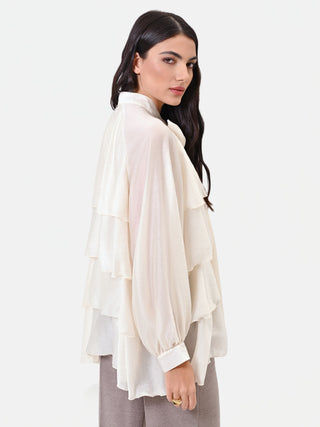 Blusa in lyocell avorio con balze e fiocco