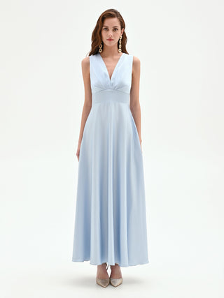 Abito lungo cielo azzurro con drappeggio in raso