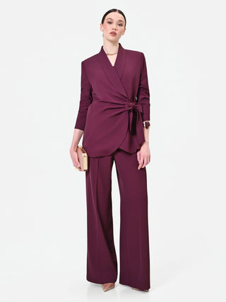 Pantalone a palazzo bordeaux dalla linea fluida