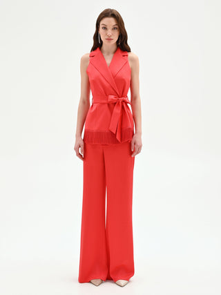 Gilet in raso rosso fragola con frange