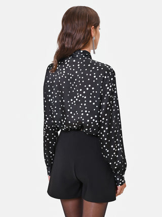 Blusa nera a pois con nastro lavallière