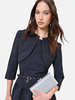 Borsa clutch argento con applicazione gioiello