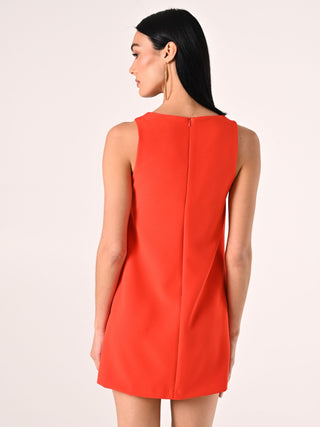 Robe fourreau orange avec boutons sertis