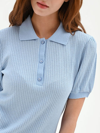 Polo azzurra in maglia a costine