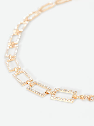 Ceinture chaîne dorée à pavé de strass
