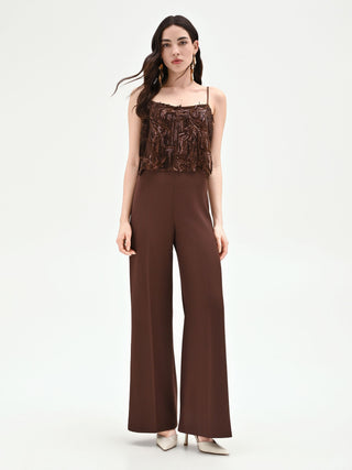Mono chocolate con lentejuelas y flecos