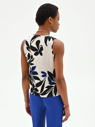 Top asimmetrico blu cina con stampa astratta