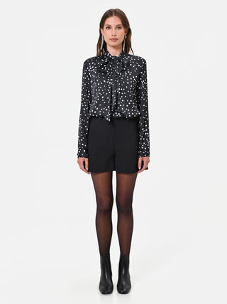 Blusa nera a pois con nastro lavallière