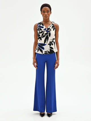 Top asimmetrico blu cina con stampa astratta