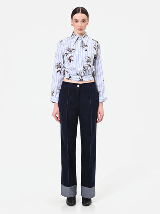 Pantalone blu navy in velluto con risvolto a contrasto