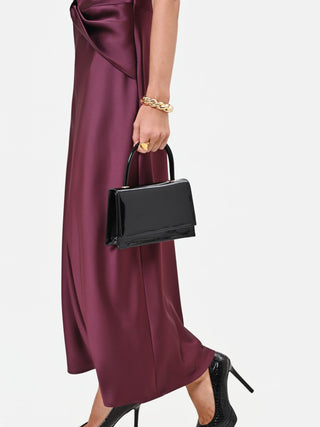 Bolso de mano negro efecto charol brillante