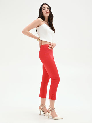 Pantalone rosso fragola con bottoni sul fondo
