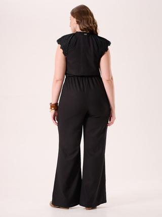 Mono curvy en lino de viscosa negro con detalles en sangallo