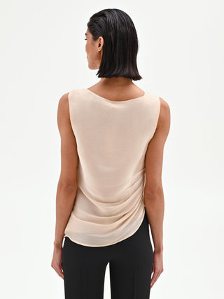 Light beige draped top in iridescent fabric