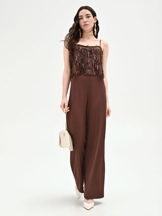 Mono chocolate con lentejuelas y flecos