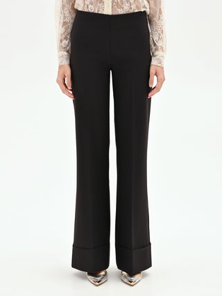 High-waisted black trousers with a cuff