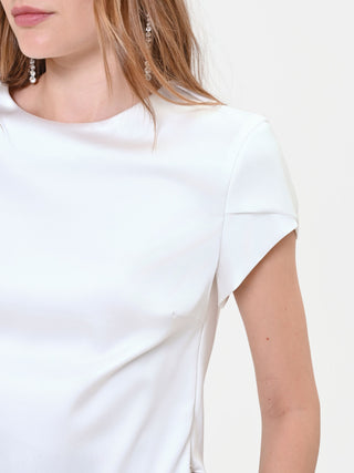 Blouse crème à manches à revers