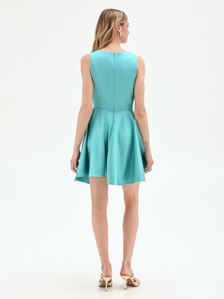 Abito corto turchese azzurro con scollo drappeggiato