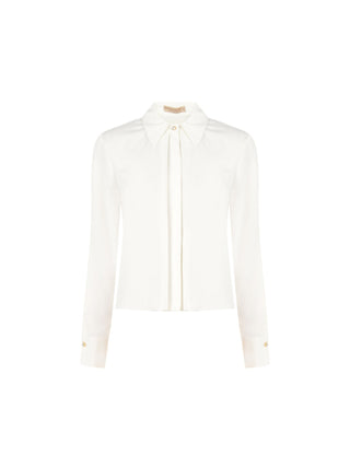Camicia bianca con bottone gioiello
