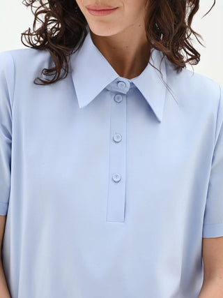 Abito camicia azzurro con orlo a palloncino