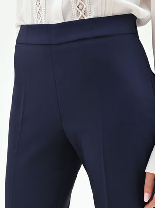 Pantaloni a zampa blu in tessuto tecnico