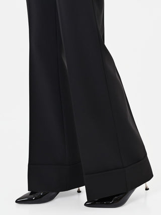 Pantalone nero a vita alta con maxi risvolto