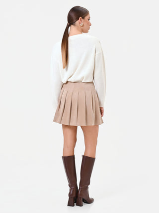 Minigonna beige a pieghe effetto scamosciato