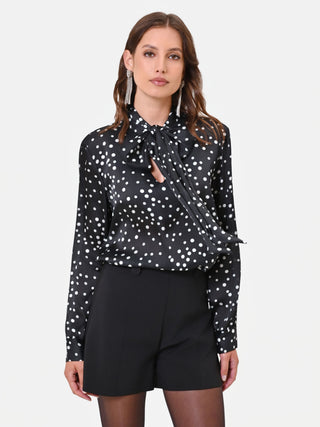 Blusa nera a pois con nastro lavallière