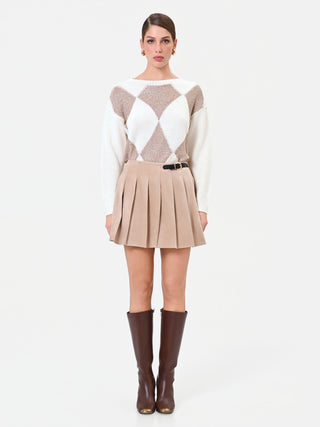 Minigonna beige a pieghe effetto scamosciato