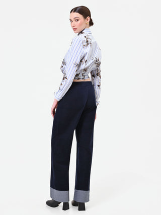 Pantalone blu navy in velluto con risvolto a contrasto