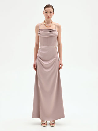 Abito lungo atelier rosa antico con drappeggio laterale