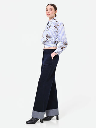 Pantalone blu navy in velluto con risvolto a contrasto