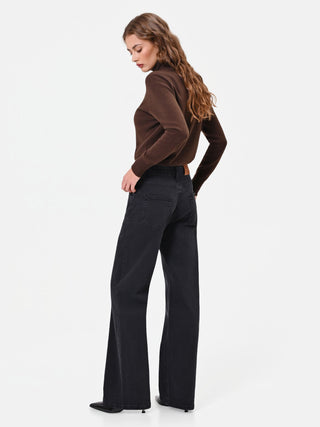 Jeans neri a gamba larga con strass