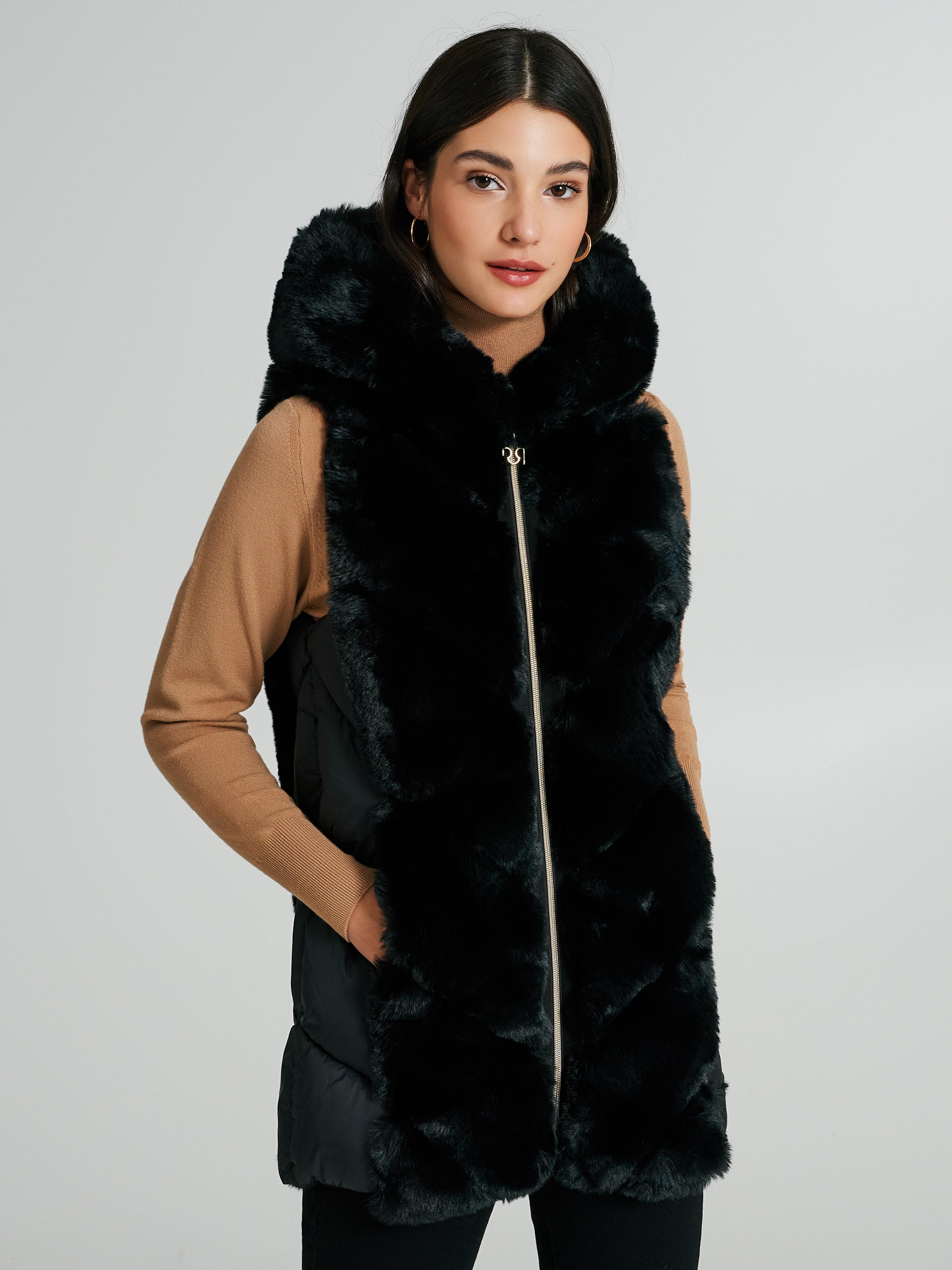 Chaleco de sales plumas