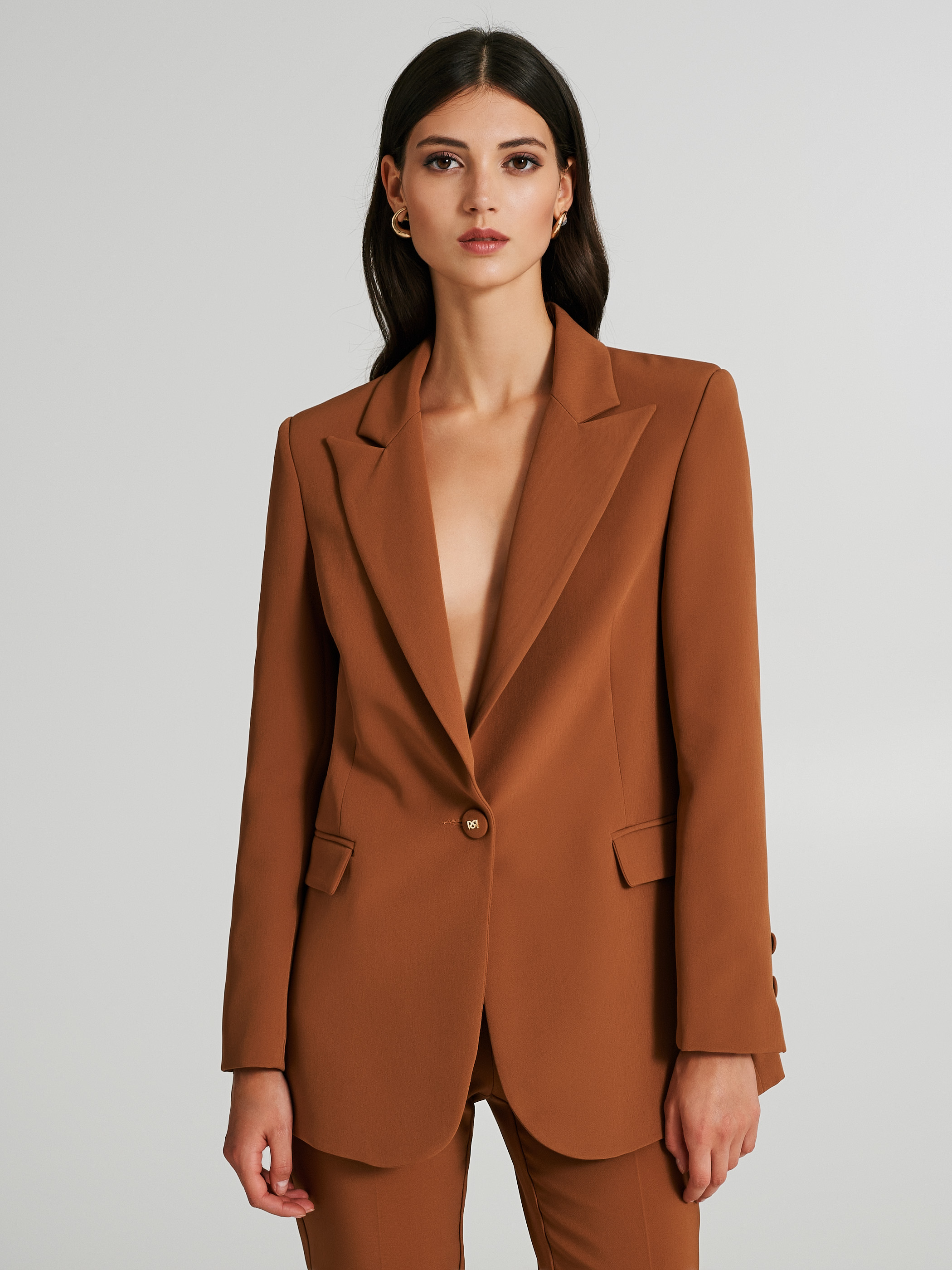 Veste longue bouton
