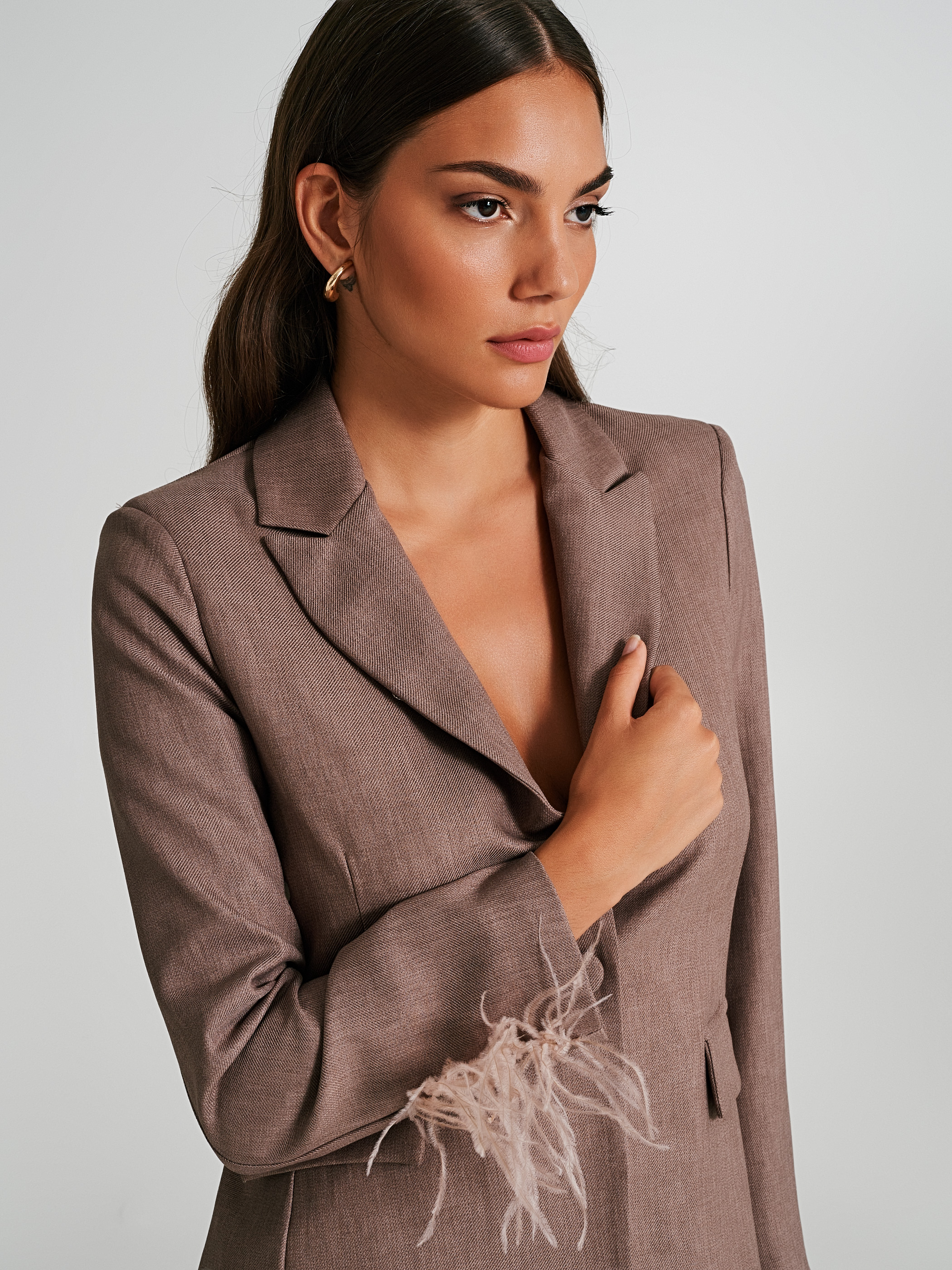 Jacket store with feathers